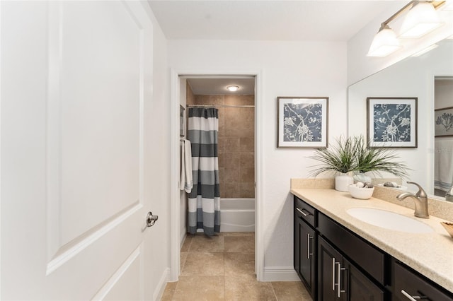 full bathroom featuring shower / bath combination with curtain, vanity, and tile patterned floors