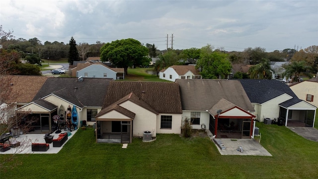 birds eye view of property with a residential view