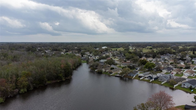 bird's eye view featuring a water view and a residential view