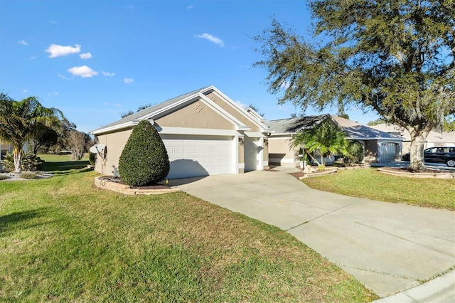 view of front of home featuring a front yard and a garage