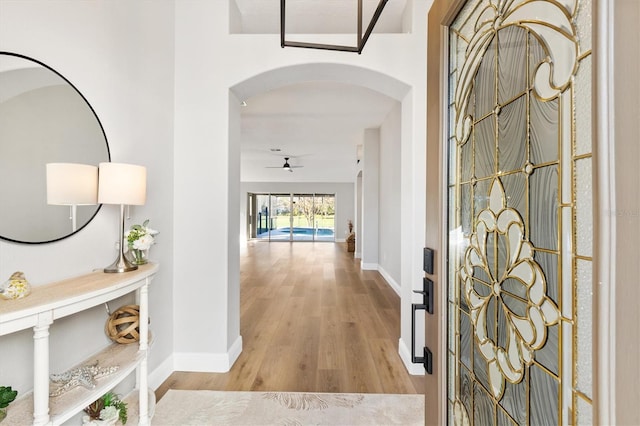 hall with light hardwood / wood-style floors