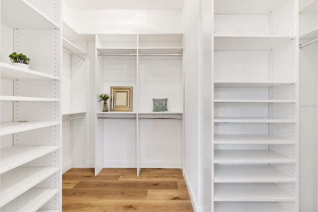 walk in closet featuring light wood-type flooring