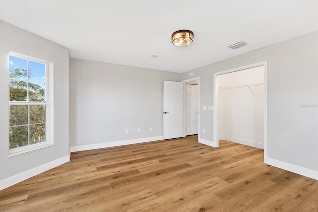 unfurnished bedroom featuring light hardwood / wood-style flooring