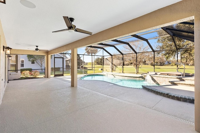 view of pool featuring pool water feature, an in ground hot tub, ceiling fan, a patio, and a lanai