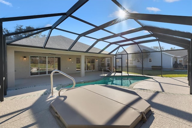 view of pool featuring a lanai and a patio area