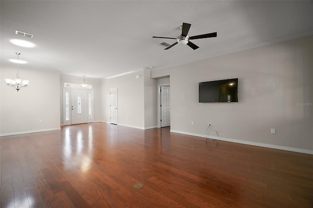 unfurnished living room with dark wood-style flooring, crown molding, visible vents, baseboards, and ceiling fan with notable chandelier