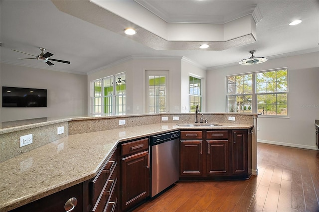 kitchen featuring ornamental molding, dark wood finished floors, dishwasher, and a sink