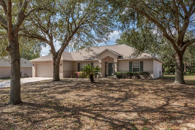 ranch-style house featuring a garage