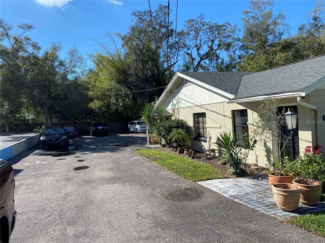 view of home's exterior featuring a shingled roof