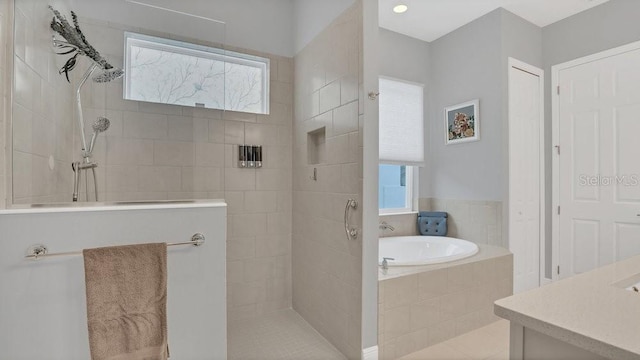 full bathroom featuring a walk in shower and a garden tub