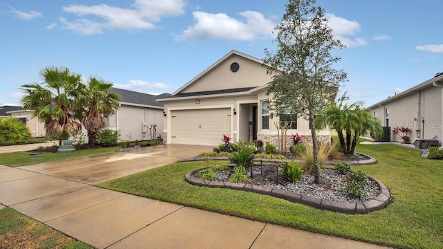 view of front facade with concrete driveway, an attached garage, a front lawn, and stucco siding