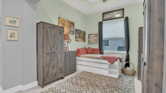 bedroom featuring baseboards