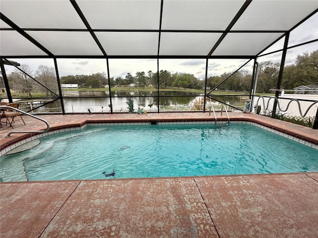 pool featuring a lanai and a water view