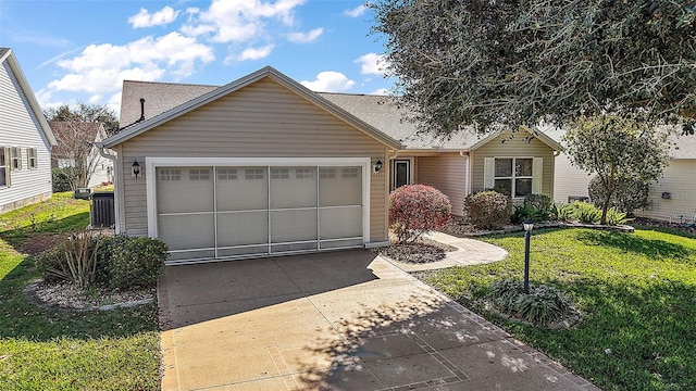 view of front of house featuring a garage, concrete driveway, a front lawn, and a shingled roof