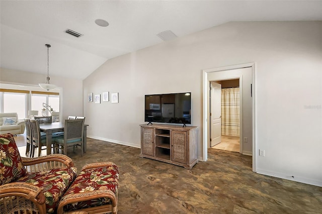 living room with visible vents, vaulted ceiling, and baseboards