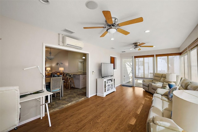 living area with a wall unit AC, dark wood-style floors, visible vents, and a wealth of natural light