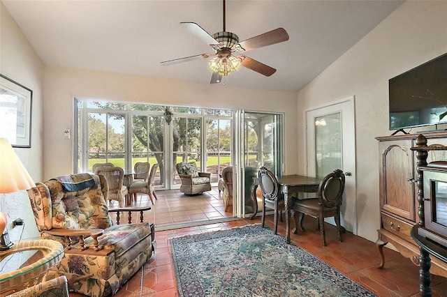 sunroom featuring vaulted ceiling and ceiling fan