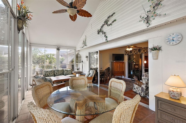 sunroom with vaulted ceiling and ceiling fan