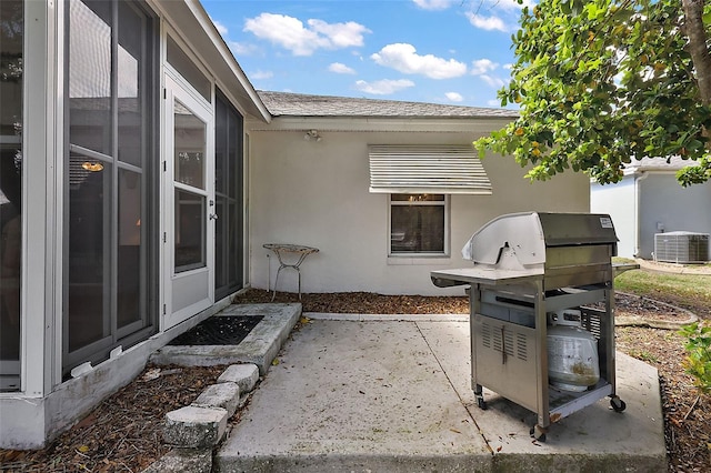 view of patio / terrace with central AC unit and area for grilling