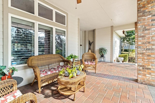 view of patio featuring ceiling fan