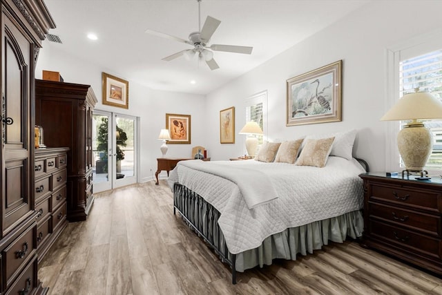 bedroom featuring ceiling fan, access to outside, french doors, and wood-type flooring