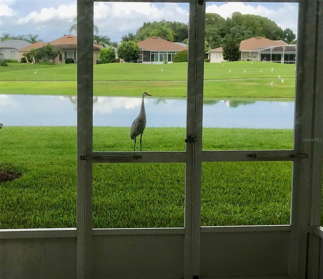 exterior space with a water view