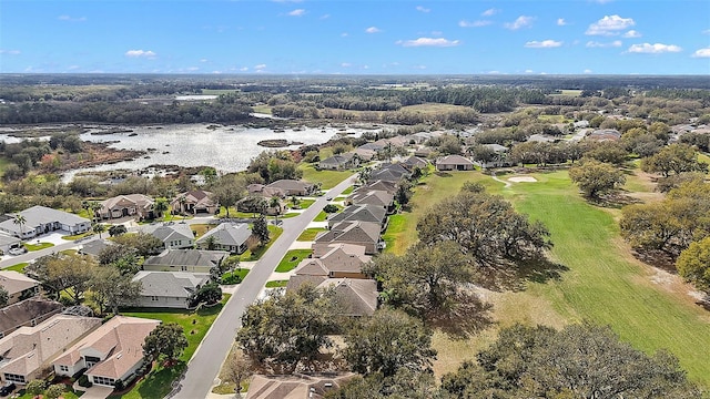 bird's eye view with a water view and a residential view