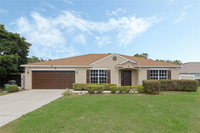 ranch-style home with a garage and a front yard