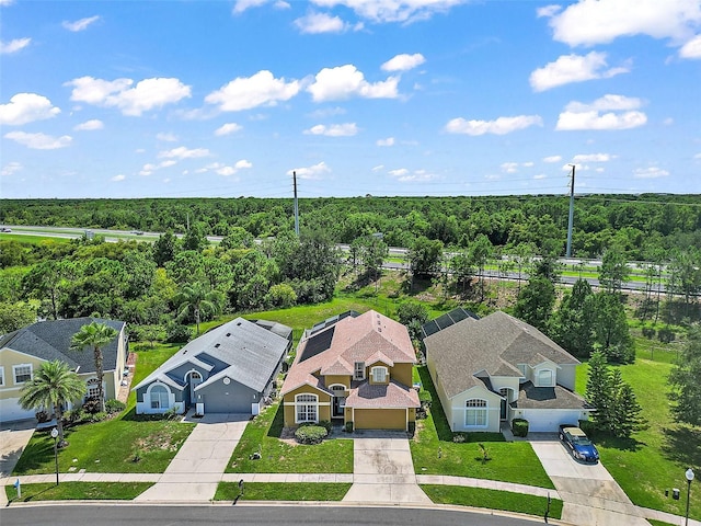 aerial view with a wooded view