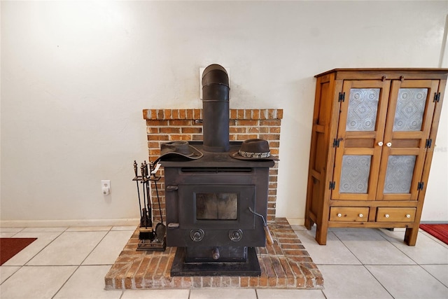 details with a wood stove and baseboards