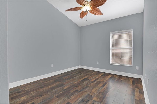 empty room with a ceiling fan, baseboards, and dark wood-style flooring