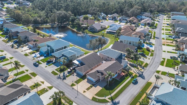 aerial view with a water view and a residential view