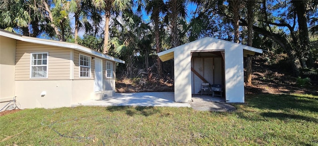 exterior space with an outbuilding and a storage shed