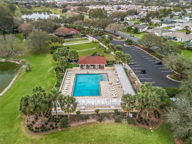 birds eye view of property featuring a water view