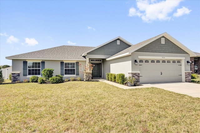 view of front facade with an attached garage, stucco siding, concrete driveway, and a front yard