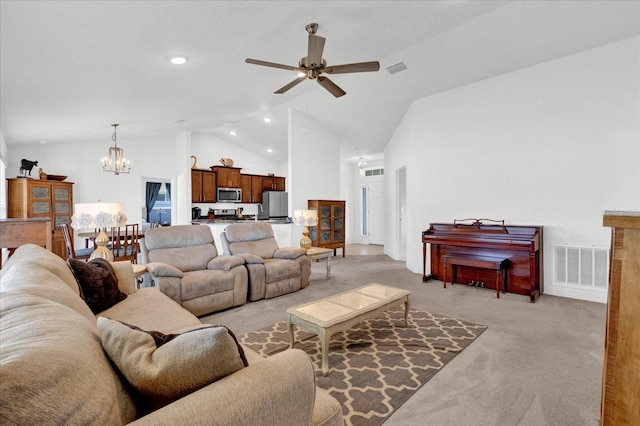 living room featuring light carpet, high vaulted ceiling, visible vents, and ceiling fan with notable chandelier