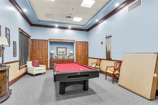 rec room featuring ornamental molding, visible vents, and carpet flooring