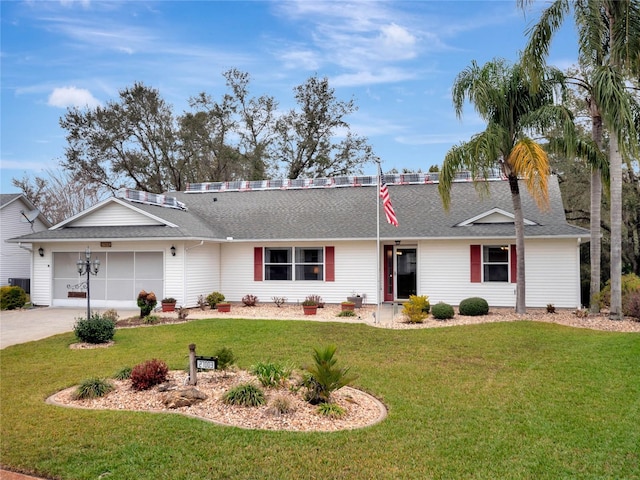 ranch-style house featuring a garage, concrete driveway, a front lawn, and a shingled roof