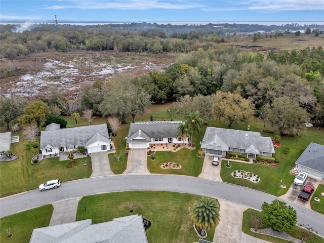 birds eye view of property with a residential view