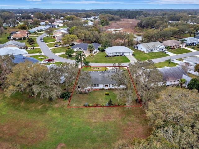 birds eye view of property with a residential view