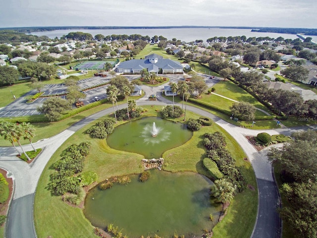 bird's eye view featuring a water view and a residential view