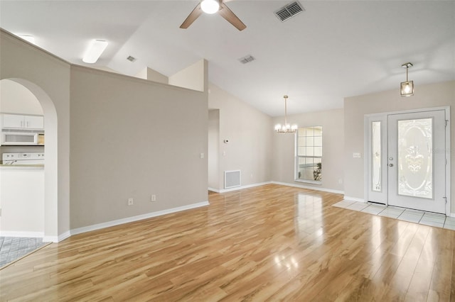 unfurnished living room with light wood-type flooring and visible vents