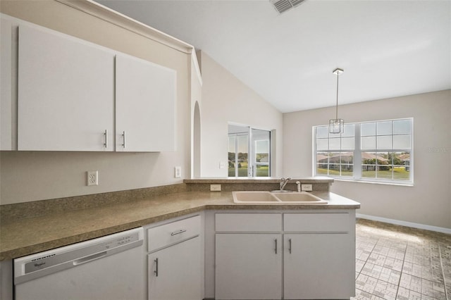 kitchen with visible vents, white dishwasher, a sink, and white cabinetry