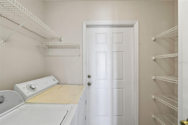 17051 SE 115th Terrace Rd, Summerfield, FL 34491 - laundry room with independent washer and dryer