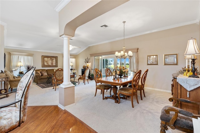 dining area featuring crown molding, decorative columns, visible vents, baseboards, and ceiling fan with notable chandelier