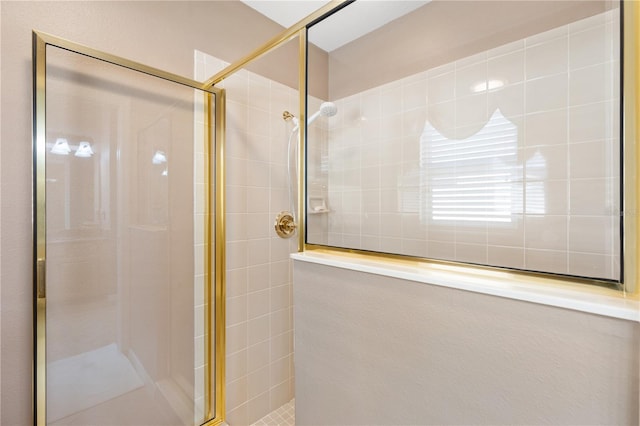 full bath featuring tiled shower