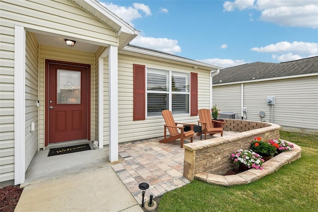 doorway to property featuring a patio area