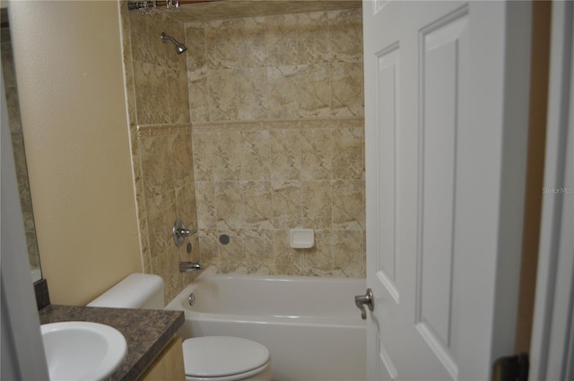 full bathroom featuring shower / bath combination, vanity, and toilet