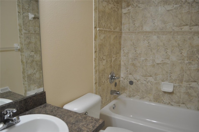 full bathroom featuring a sink, toilet, and shower / bathtub combination