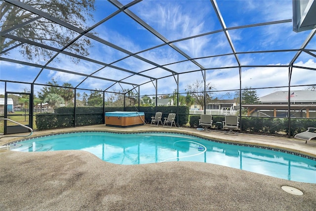 12338 S Putney Ct, Leesburg, FL 34788 - outdoor pool featuring a patio area, a lanai, and a hot tub